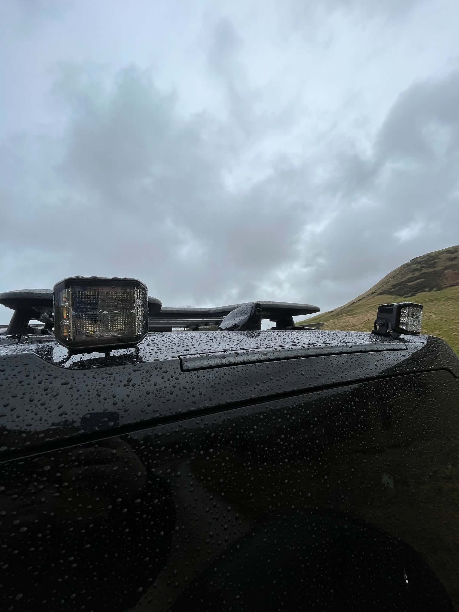 Roof-mounted LED spot lamp fitted to a 4x4