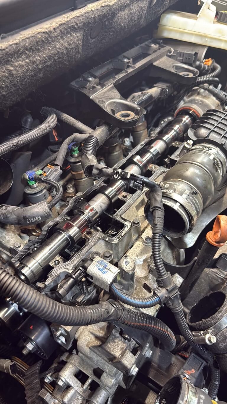 Engine bay stripped for injector work on a diesel used for short city runs