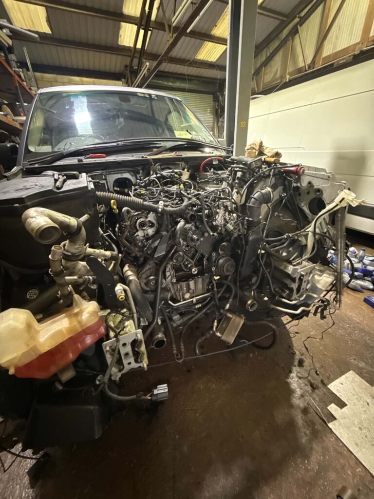 Van with the engine out during a major repair for a Middlewich customer